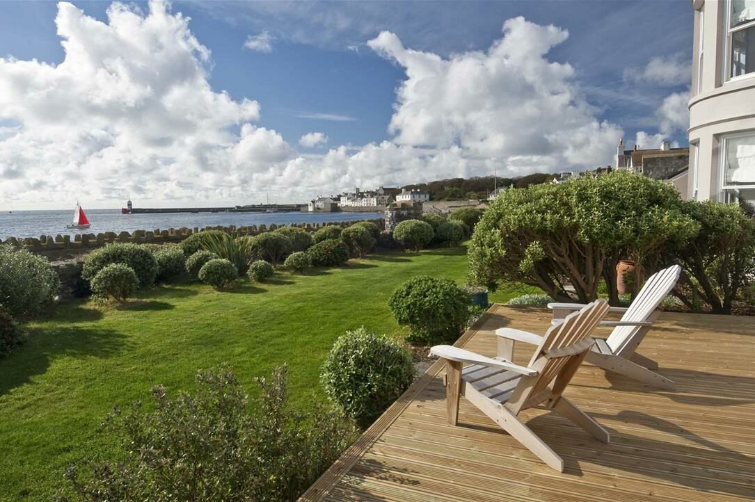 Sea view from the garden deck at Bay House, a waterfront house to let in Castletown, Isle of Man